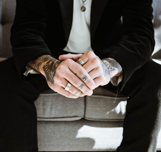 Groom wearing wedding band