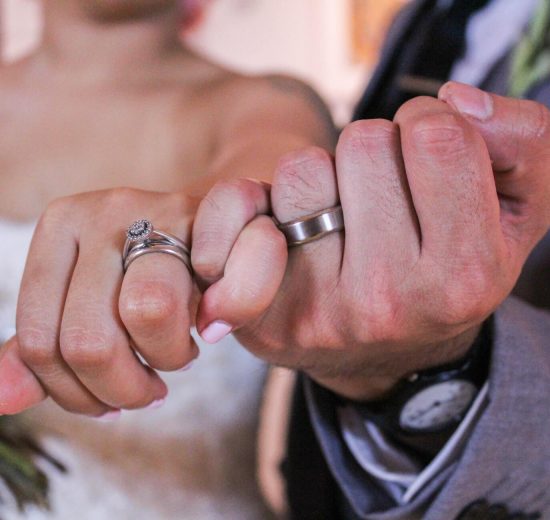 Couple wearing tantalum wedding rings