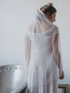 Bride wearing silk tulle bridal veil