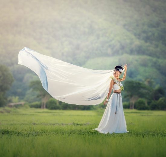 Bride in white dress outdoors