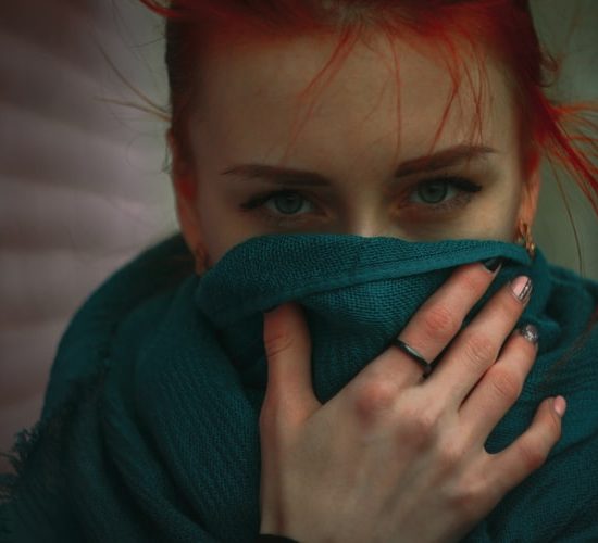 Girl wearing black gold ring