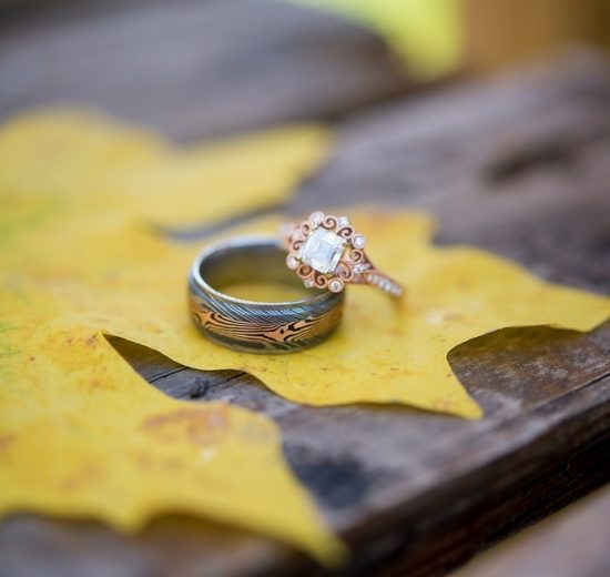 Asscher shape diamond on yellow leaf