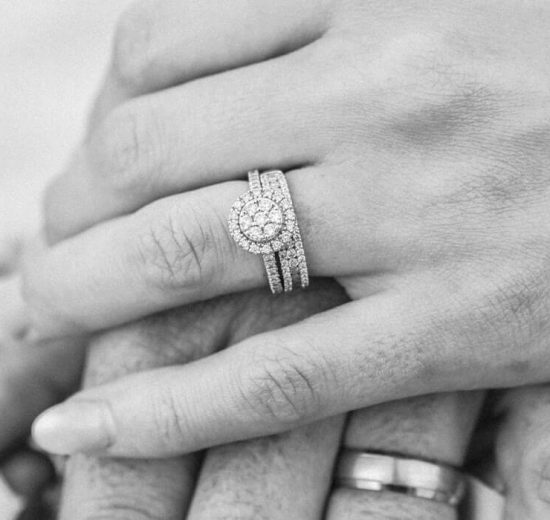 Lab grown engagement ring on woman's finger