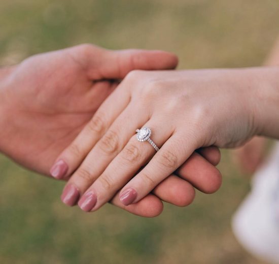 Bride wearing lab created diamond engagement ring