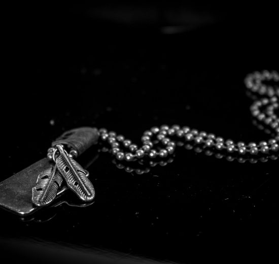 Gold chain on black background
