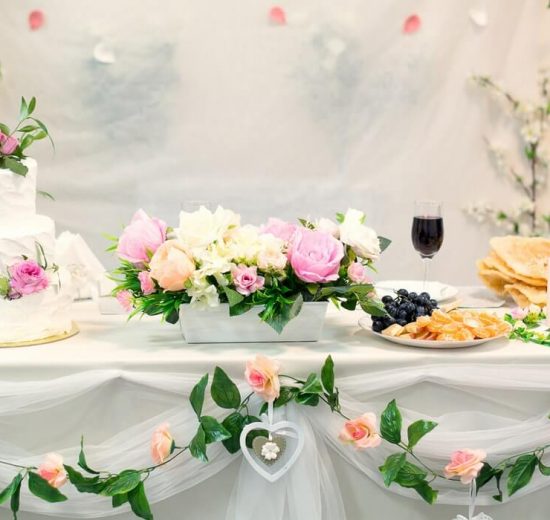 Wedding cake on decorated table