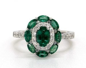 Emerald and diamond floral engagement ring