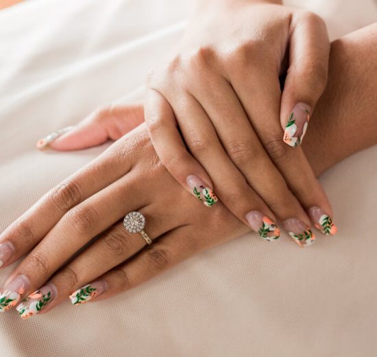 Woman wearing halo ring setting