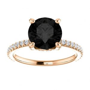 Black diamond engagement ring with yellow gold