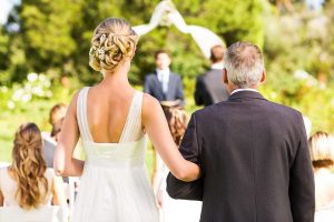 father giving away bride